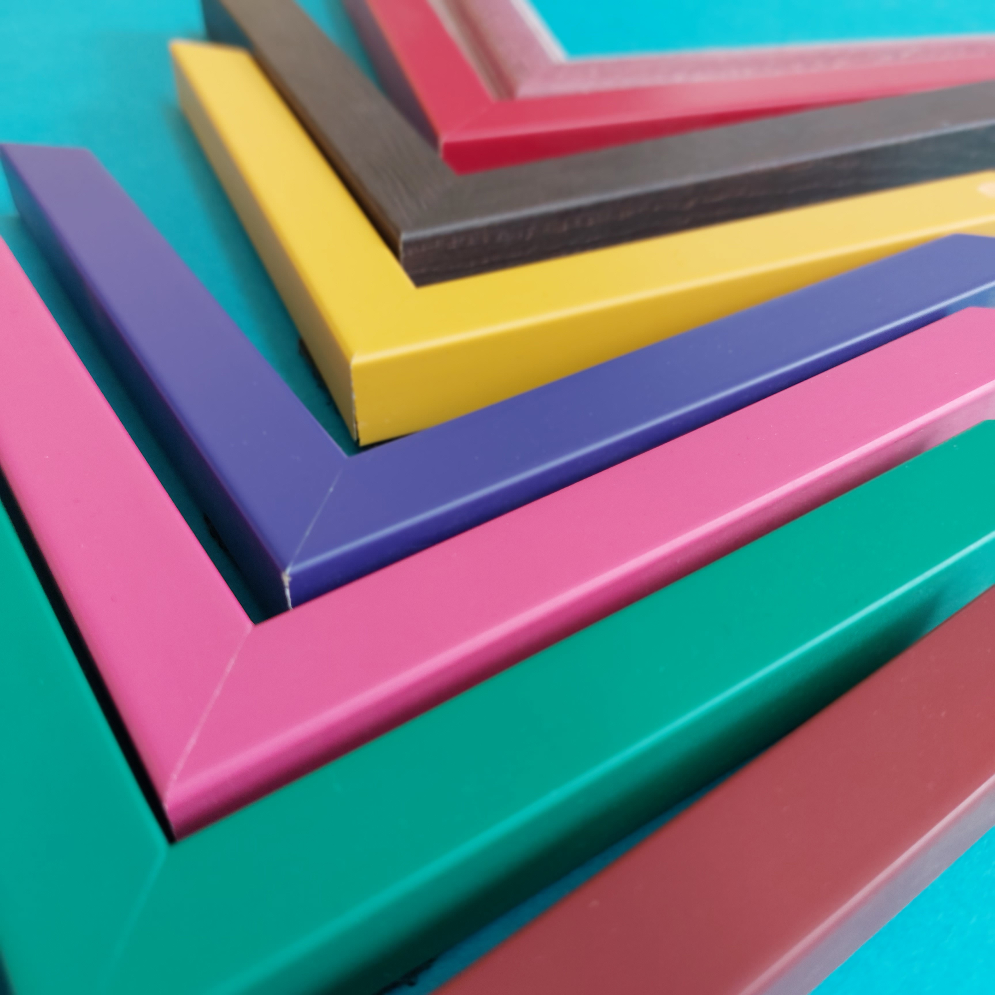 Assortment of brightly coloured picture frames